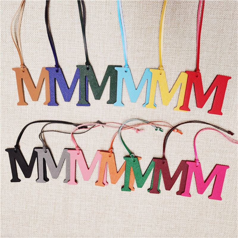 XMESSUN New English Letters M  - Monogram Keychain Leather 评论和价格